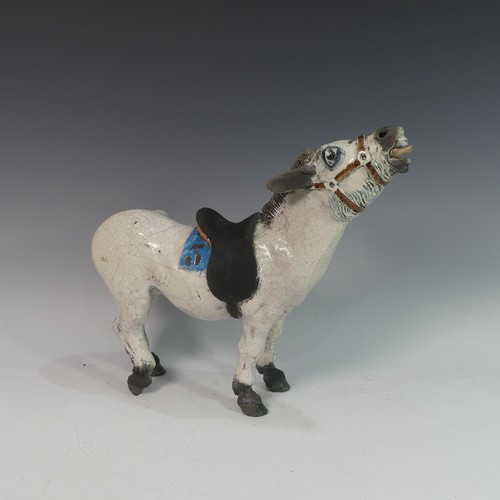 123 - Lawson E. Rudge (b. 1936), a raku fired studio pottery sculpture of a Donkey, numbered 5 to saddle c... 