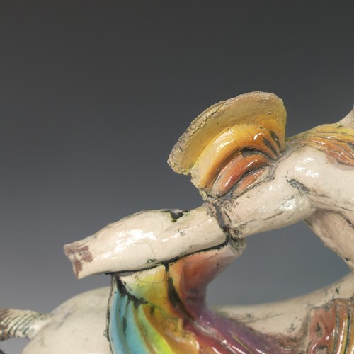 70 - Lawson E. Rudge (b. 1936), a raku fired studio pottery sculpture of a Centaur, with rainbow design, ... 