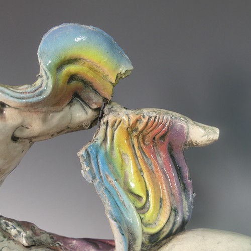 70 - Lawson E. Rudge (b. 1936), a raku fired studio pottery sculpture of a Centaur, with rainbow design, ... 