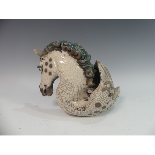 72 - Lawson E. Rudge (b. 1936), a raku fired studio pottery sculpture of a Horse, modelled as half horse ... 