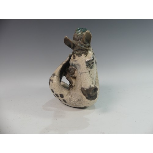 72 - Lawson E. Rudge (b. 1936), a raku fired studio pottery sculpture of a Horse, modelled as half horse ... 