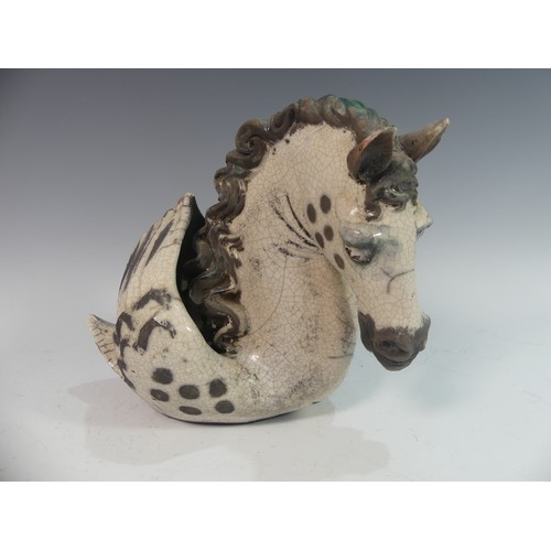 72 - Lawson E. Rudge (b. 1936), a raku fired studio pottery sculpture of a Horse, modelled as half horse ... 