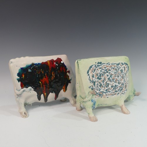 76 - Lawson E. Rudge (b. 1936), a studio pottery sculpture of a Grazing Cow, H 26cm, together with anothe... 