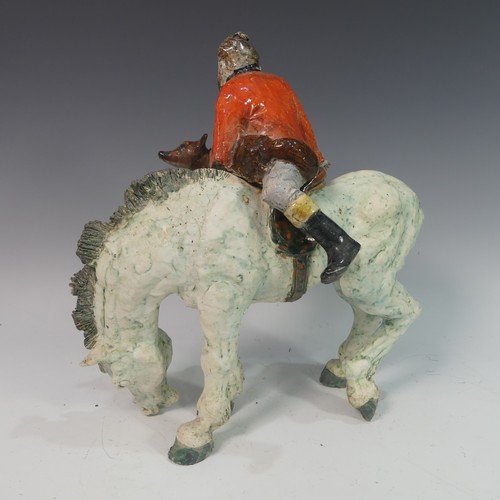 81 - Lawson E. Rudge (b. 1936), a raku fired studio pottery sculpture of a Grazing Horse, with self portr... 