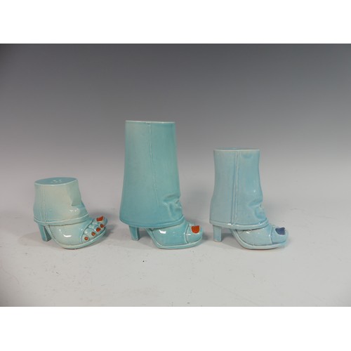 87 - Lawson E. Rudge (b. 1936), a pair of blue glazed studio pottery Salt and Pepper Pots, modelled as fe... 