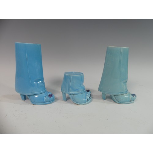 89 - Lawson E. Rudge (b. 1936), a pair of blue glazed studio pottery Salt and Pepper Pots, modelled as fe... 