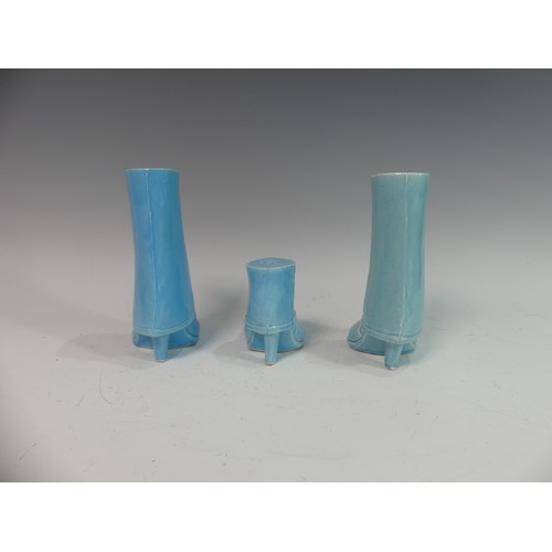 89 - Lawson E. Rudge (b. 1936), a pair of blue glazed studio pottery Salt and Pepper Pots, modelled as fe... 