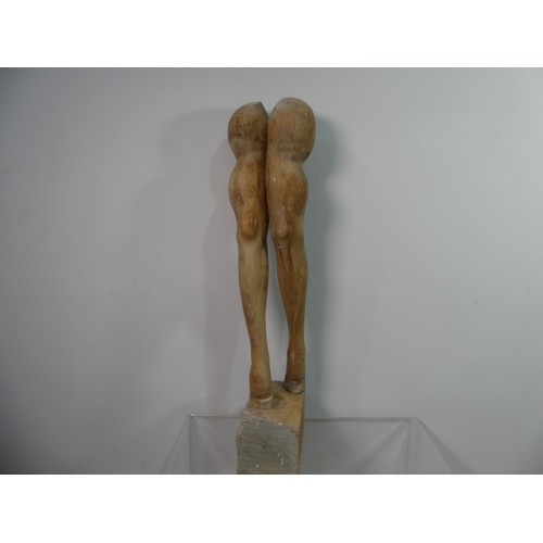 103 - Lawson E. Rudge (b. 1936), a carved wooden sculpture 'Legs and Arms', carved as a pair of legs weari... 