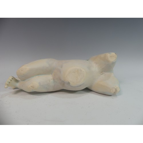 105 - Lawson E. Rudge (b. 1936), a studio pottery sculpture of a Baby, modelled laying on her stomach, L 3... 