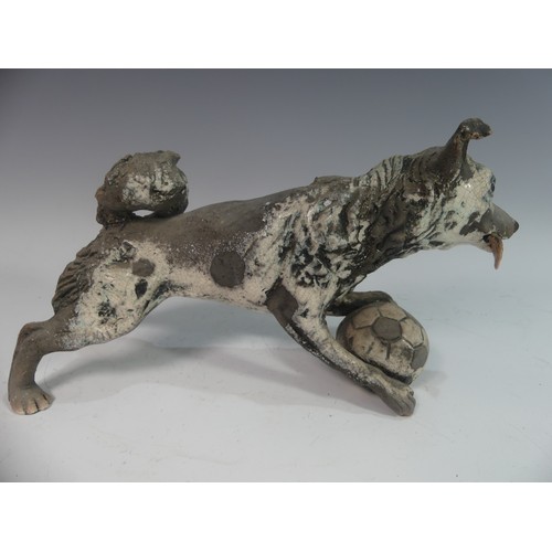 116 - Lawson E. Rudge (b. 1936), a raku fired studio pottery sculpture of a Border Collie, modelled playin... 