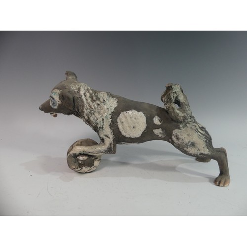 116 - Lawson E. Rudge (b. 1936), a raku fired studio pottery sculpture of a Border Collie, modelled playin... 