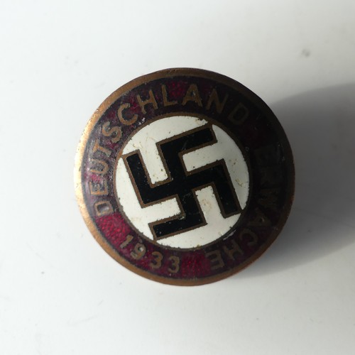 378 - A German NSDAP 'Party' Badge, the front dated 1933, the reverse marked 'GES. GESCH.' and with RZM lo... 