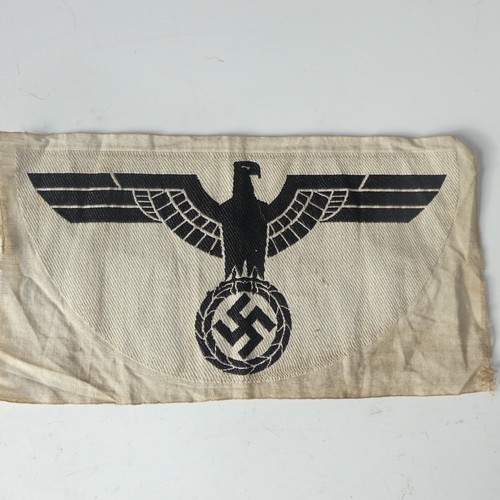 378 - A German NSDAP 'Party' Badge, the front dated 1933, the reverse marked 'GES. GESCH.' and with RZM lo... 