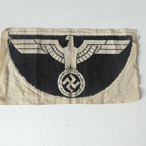 378 - A German NSDAP 'Party' Badge, the front dated 1933, the reverse marked 'GES. GESCH.' and with RZM lo... 