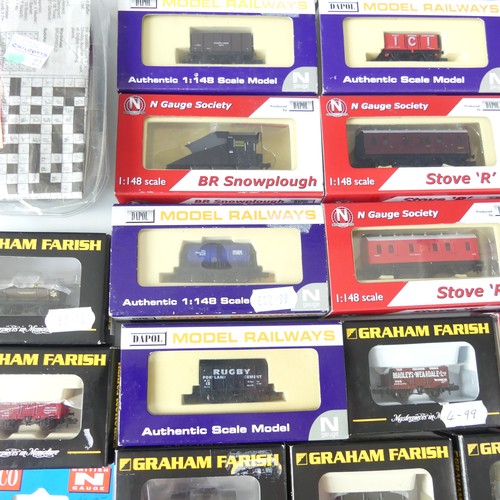 205 - A collection of twenty-two N gauge model railway wagons and vans, by Graham Farish, Dapol and Peco, ... 