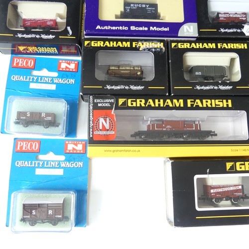 205 - A collection of twenty-two N gauge model railway wagons and vans, by Graham Farish, Dapol and Peco, ... 