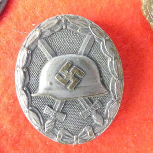 404 - A presentation of ten various German WW2 period Badges and Pins, including an Infantry Assault Badge... 