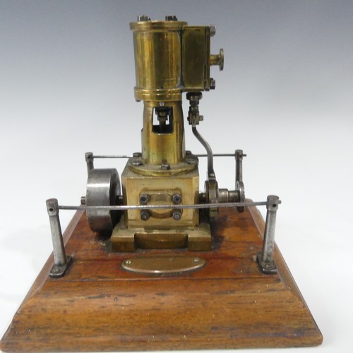 214 - An apprentice piece Stationary Steam engine, on wooden stand dated 1938 together with a Mamod tracti... 