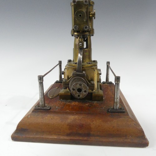 214 - An apprentice piece Stationary Steam engine, on wooden stand dated 1938 together with a Mamod tracti... 