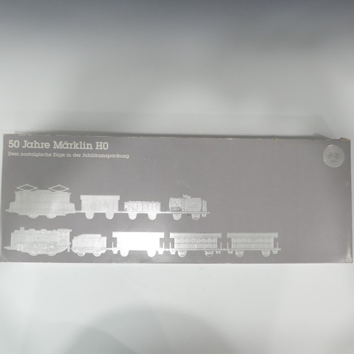 219 - A Marklin HO gauge boxed double train set,  Jubilee 50th anniversary '50 Jahre Marklin HO', comprisi... 