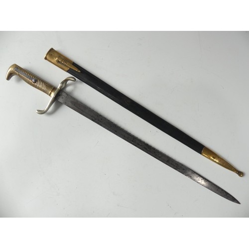 418 - An 1871 Sawback Imperial German Bayonet, with brass and steel hilt, steel sawback blade with very fa... 