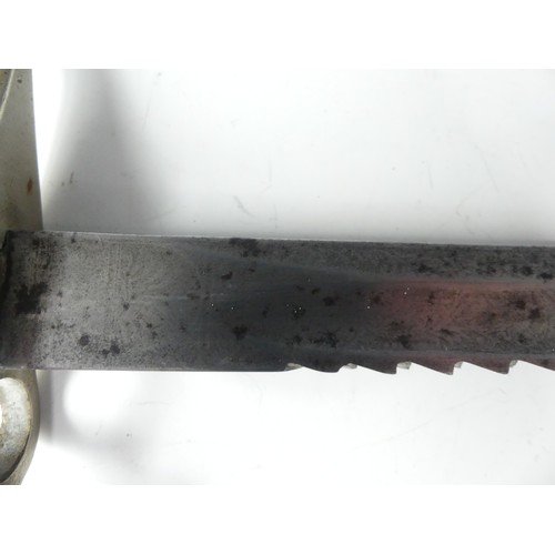 418 - An 1871 Sawback Imperial German Bayonet, with brass and steel hilt, steel sawback blade with very fa... 