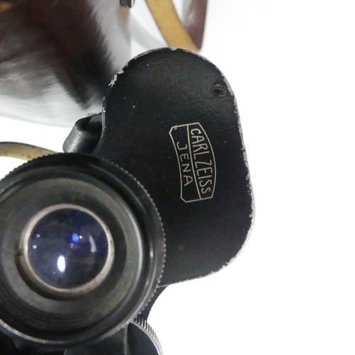 307 - A cased pair of Carl Zeiss Jena Binoculars 10x50 Dekarem with straps, together with a cut glass pepp... 