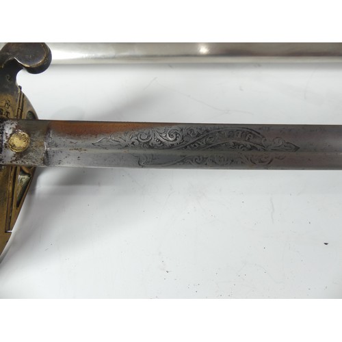 426 - An 1821 pattern Victorian Officer's Sword, with brass swept hilt having crowned VR cipher to the cen... 