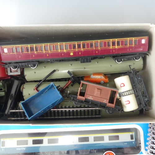 231 - A quantity of OO gauge model railway  boxed examples to include Hornby R550 black livery Loco and Ta... 