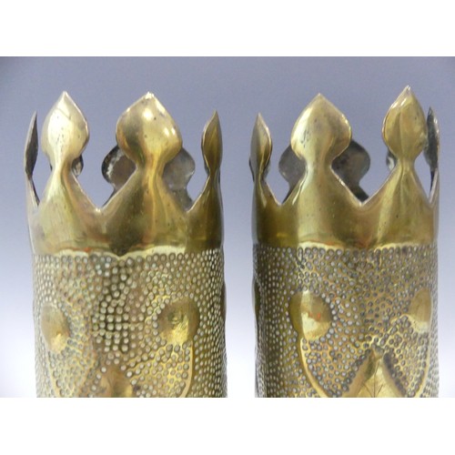 435 - A pair of Trench Art embossed vases, engraved to bottom 