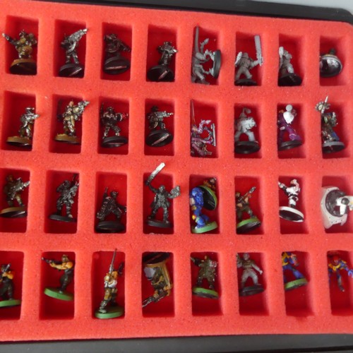 249 - A quantity of Games Workshop War Hammer gaming figures and items, including two games workshop cases... 