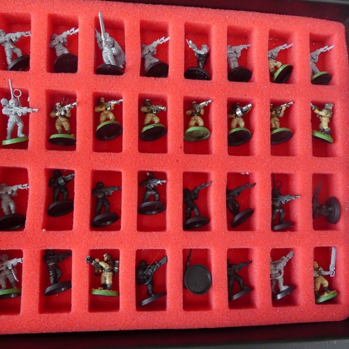 249 - A quantity of Games Workshop War Hammer gaming figures and items, including two games workshop cases... 