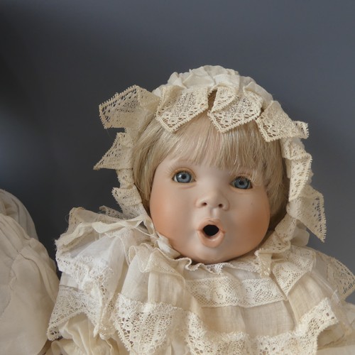 250 - A 1920's composition and cloth Baby Boy doll, cloth body contains crier, sleeping eyes and open mout... 