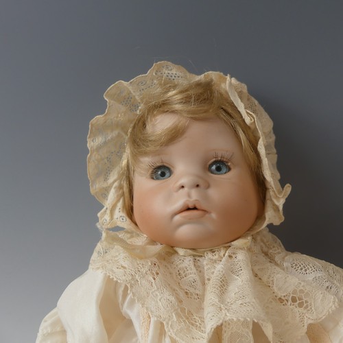 250 - A 1920's composition and cloth Baby Boy doll, cloth body contains crier, sleeping eyes and open mout... 