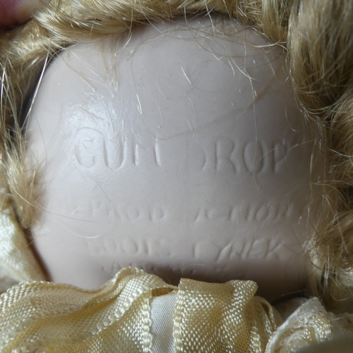 250 - A 1920's composition and cloth Baby Boy doll, cloth body contains crier, sleeping eyes and open mout... 