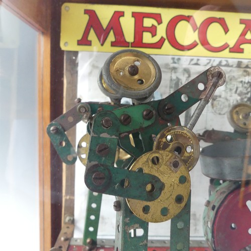 324 - Beatles Memorabilia, A set of four Remco Beatles Big Head dolls together with a clockwork Meccano mo... 