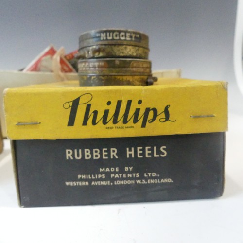 335 - A large collection of vintage shoe repair/cobblers items, including Phillips rubber heels and soles,... 