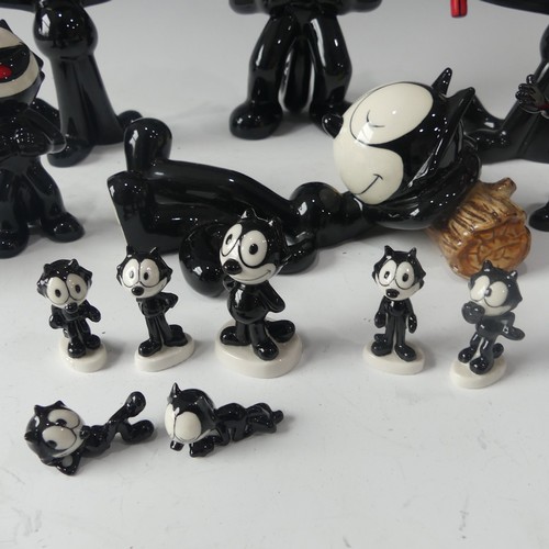 264 - A Collection of Wade Felix the Cat figures, two large boxed figures together with various loose cera... 