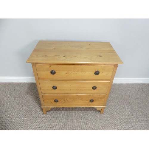 584 - A pine Chest of Drawers, comprising three long drawers, on somewhat bracket feet, W 82cm x D 46cm x ... 