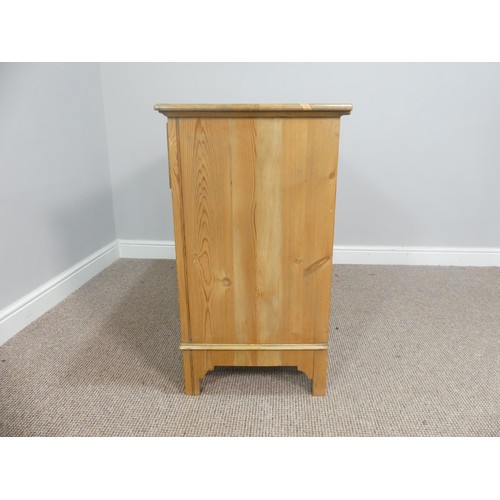 584 - A pine Chest of Drawers, comprising three long drawers, on somewhat bracket feet, W 82cm x D 46cm x ... 