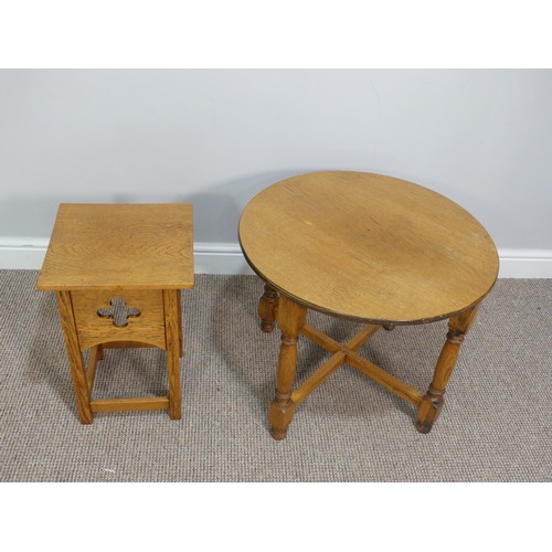 591 - A vintage oak circular Side Table, on turned legs joined by a X stretcher, Diameter 59cm x H 48cm, t... 