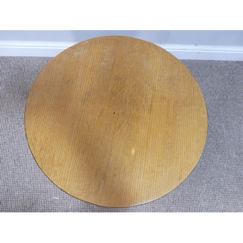 591 - A vintage oak circular Side Table, on turned legs joined by a X stretcher, Diameter 59cm x H 48cm, t... 