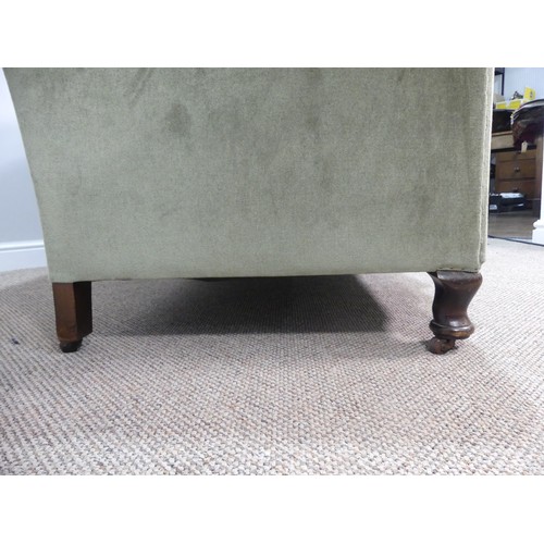 592 - A Chesterfield upholstered Sofa, with green upholstery and turned supports with castors, W 152cm x D... 