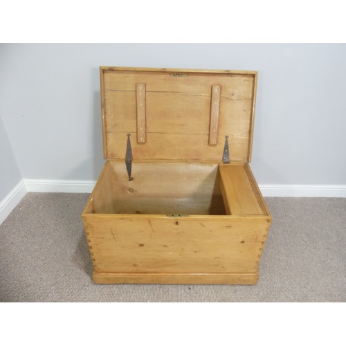 593 - A pine Blanket Box/ Chest, with iron carrying handles to either side, W 90cm x D 55cm x H 52cm.... 