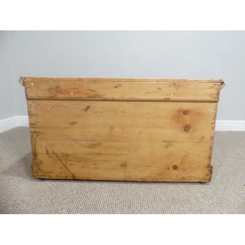 593 - A pine Blanket Box/ Chest, with iron carrying handles to either side, W 90cm x D 55cm x H 52cm.... 