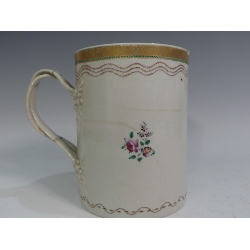 503 - A Chinese export porcelain Armorial Tankard, with double strap handle, decorated with a gilt border,... 