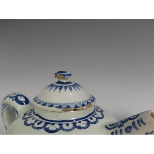 504 - A large early 19thC pearlware blue and white Tankard, decorated with Chinoiserie design H 15cm, toge... 