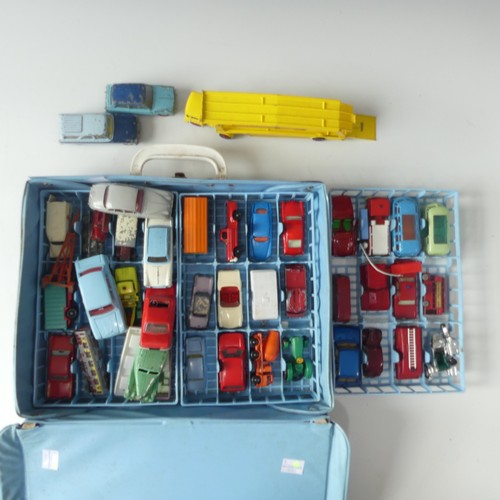 292 - A Matchbox Toys Collectors Case containing approximately fifty four models, including cars, vans, ca... 