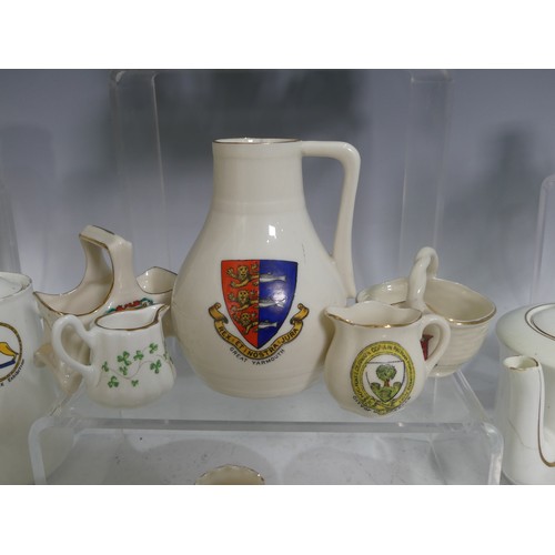 506 - A large qty of Goss and Crested China, to include a large Goss model of the Oak Pitcher Peculiar to ... 