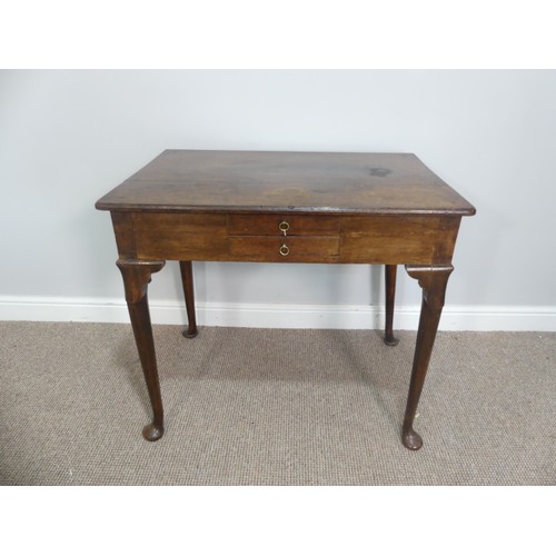 615 - A Georgian oak Side Table, the rectangular top above two drawers to the front and a further drawer t... 